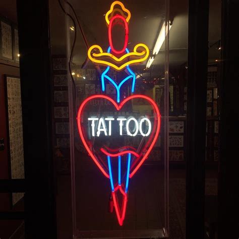 Light up your ink with striking Neon Tattoo Signs